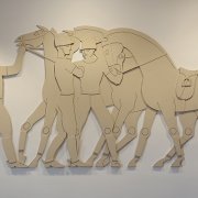 Wooden polo ponies bas relief