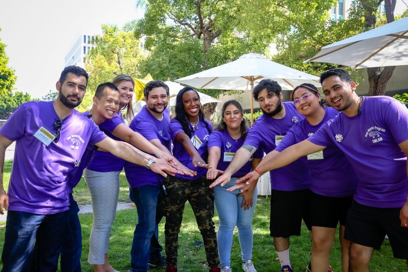 Southwestern Law students gathered in the promenade during orientation, joining hands