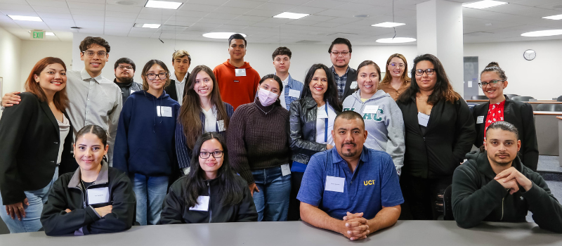 Group photo of ELAC students in the classroom with SWLAW student panelists