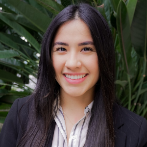 Jessica Garcia headshot against greenery