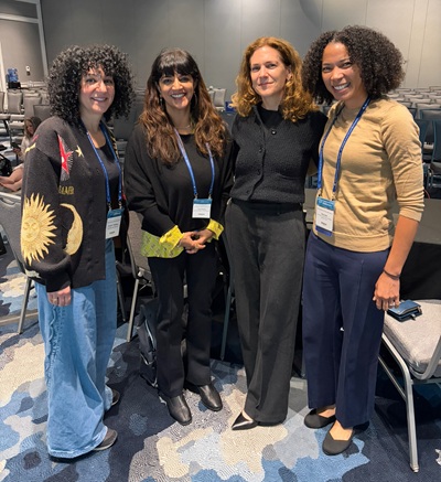 Prof. Nanda (second from the left) with three other scholars at the Bellow Scholar Convening at the AALS Clinical Conference in Portland, OR.