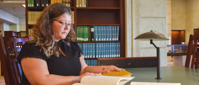Stephanie Anderson studying in library