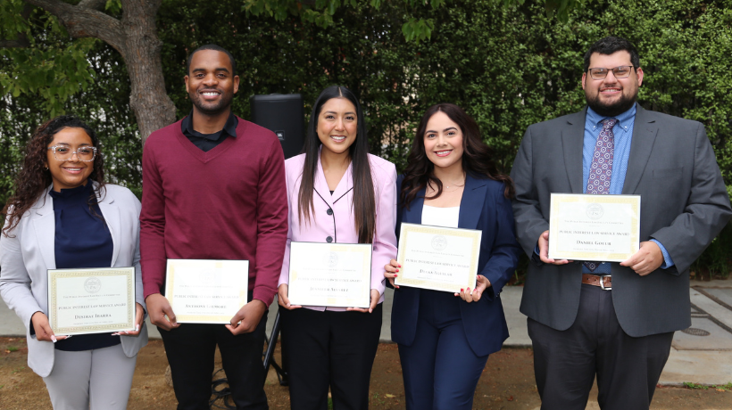 PSP Graduating Student Award recipients holding up their awards
