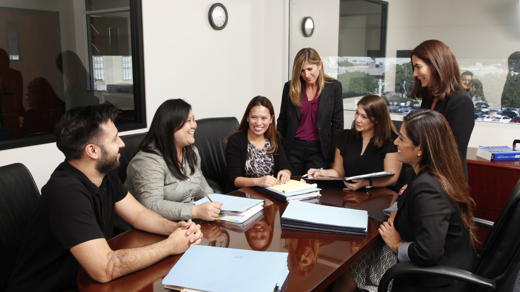 students and professors in the legal clinic