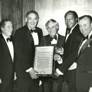 Judge Stephen Reinhardt, Councilman John Ferraro, Mayor Bradley and Southwestern President Paul Wildman present the Distinguished Citizen Award to William Robertson (center), Secretary-Treasurer of the American Federation of Labor-Congress of Industrial Organizations (AFL-CIO), during the 1980 Tom Bradley Scholarship Fund Dinner.