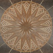 Copper starburst on entryway floor