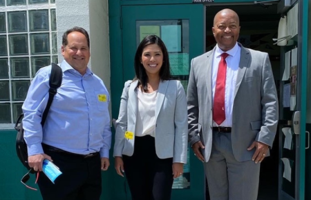 Attorney Volunteers Eric Blum and Nikki Fermin and Dorsey HS Instructor Donald Singleton